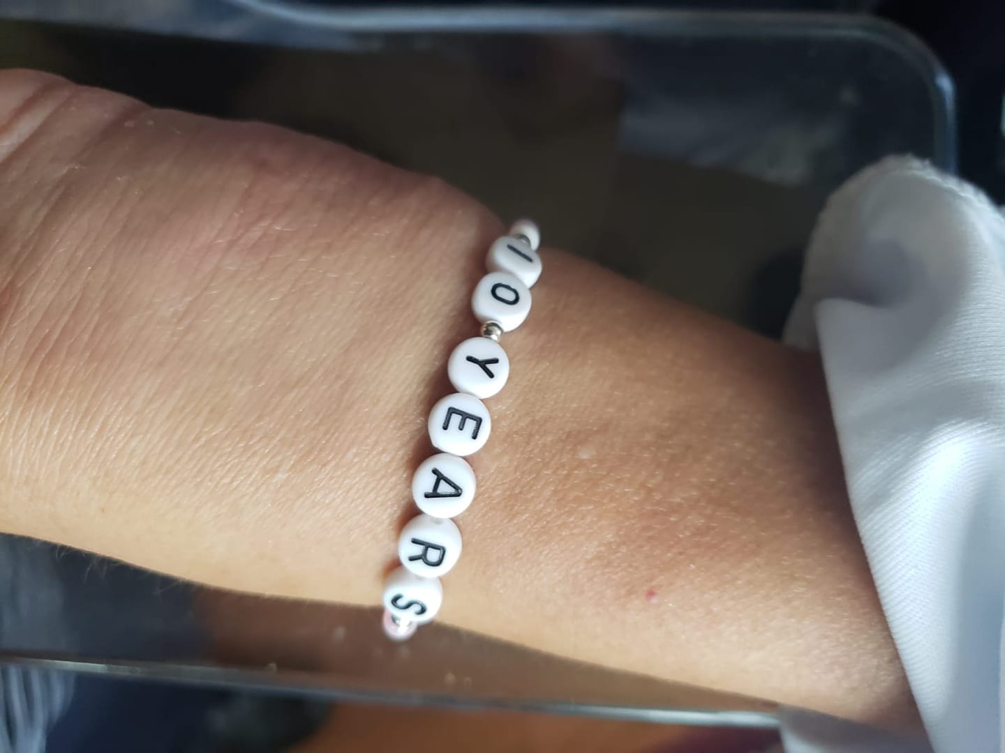 A special bracelet made by Sheri’s cousin in honor of her 10 years of breast cancer survival, 11-20.