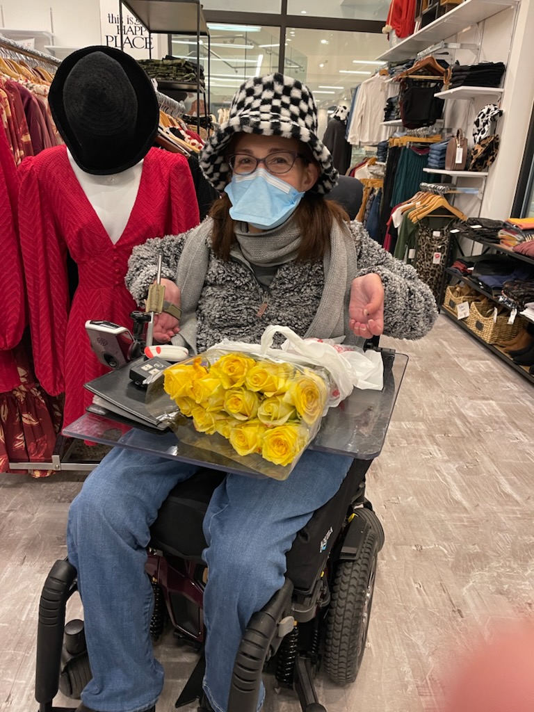 Sheri delivering roses to her favorite store owner and friend at Gossipon23rd,1-22.