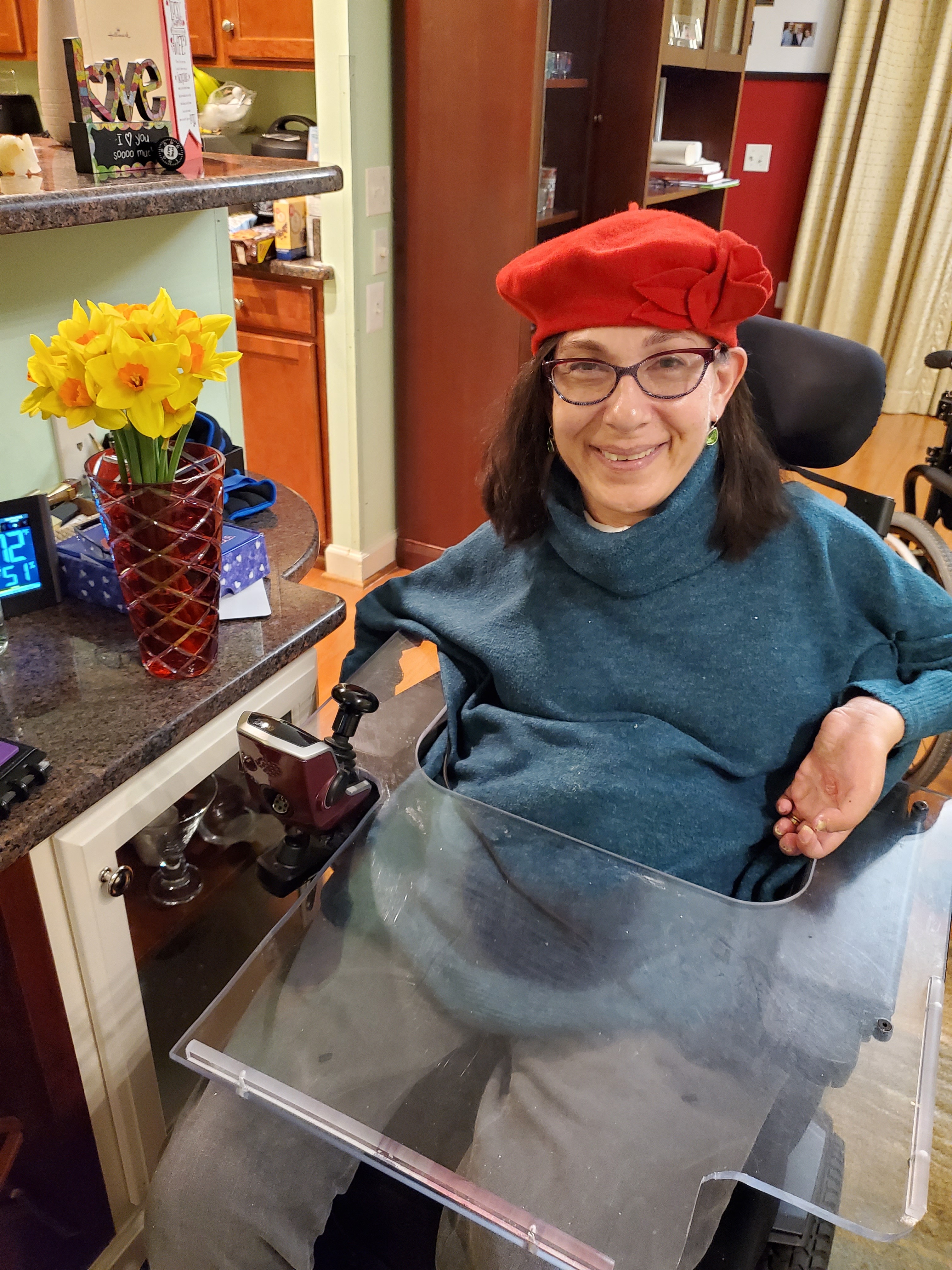 Sheri, of Happy on Wheels, ready to celebrate  Purim, 3-22.