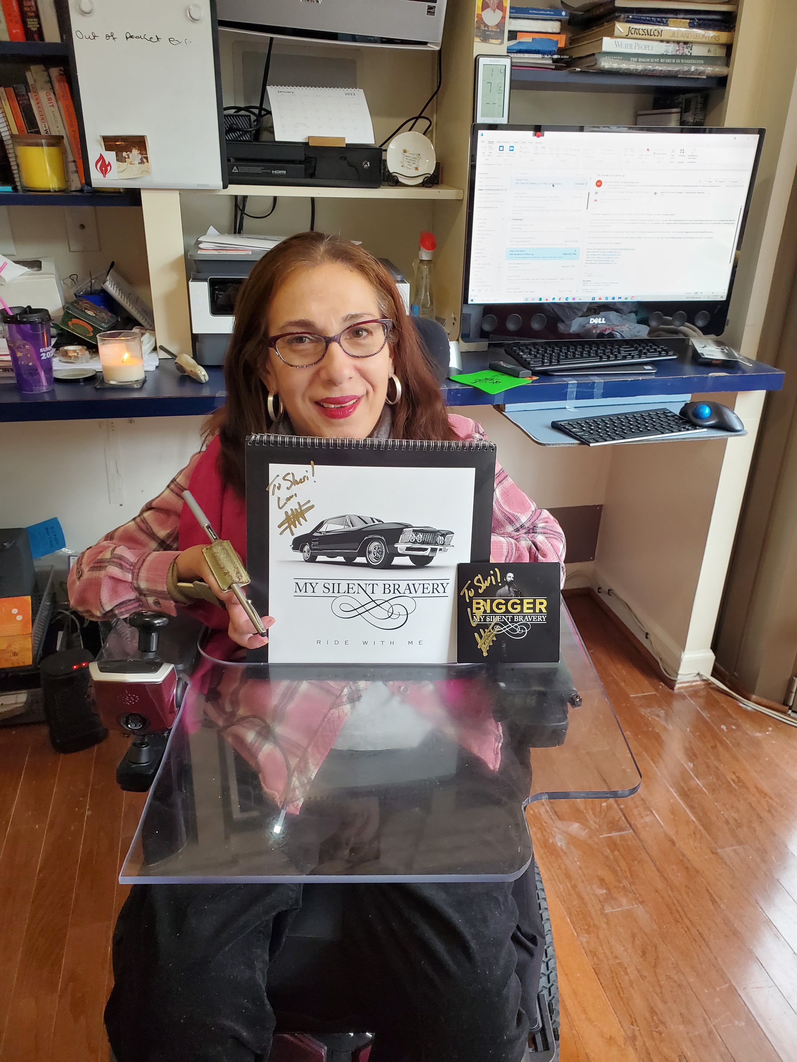 Sheri excited with her merch from one of her favorite artists, MySilentBravery.,1-22.
