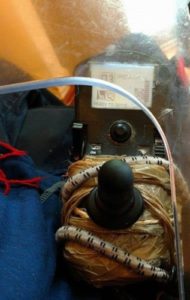 joystick held together with duct tape and bungee cord