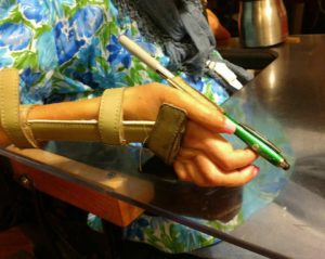 Sheri's splint with an "invented" pen/stylus holder