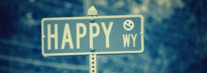 Streetsign that says "Happy Way"