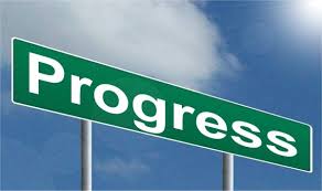 Sign with the word Progress.