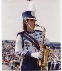 Tony in formation in marching band at JMU