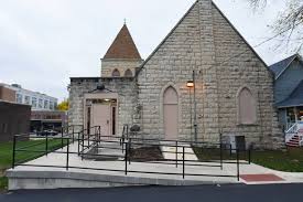 Photo of a wheelchair ramp leading to a church.