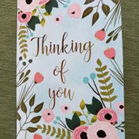 A card that says, 'Thinking of You" on the front.