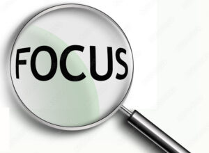 A magnifying glass with the word Focus in it.