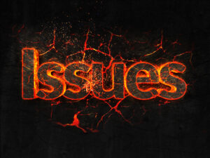 The word issues in fiery colors on a black background.