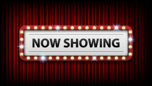 A "Now showing" sign.