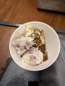 Bowl of ice cream and cake.